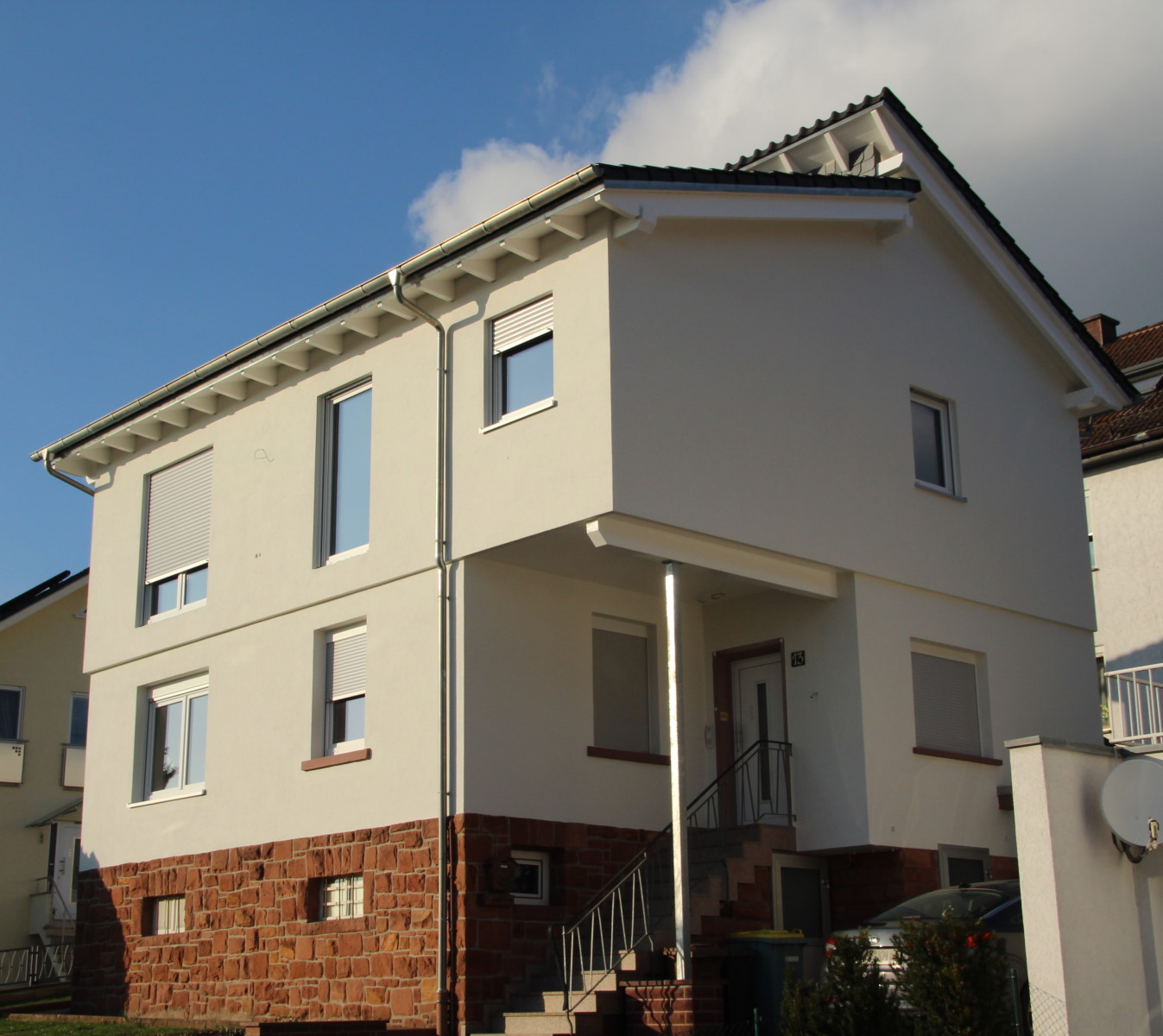 Einfamilienhaus mit aufgestocktem Obergeschoss in Holzrahmenbauweise